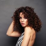 womens permed medium length tight curls