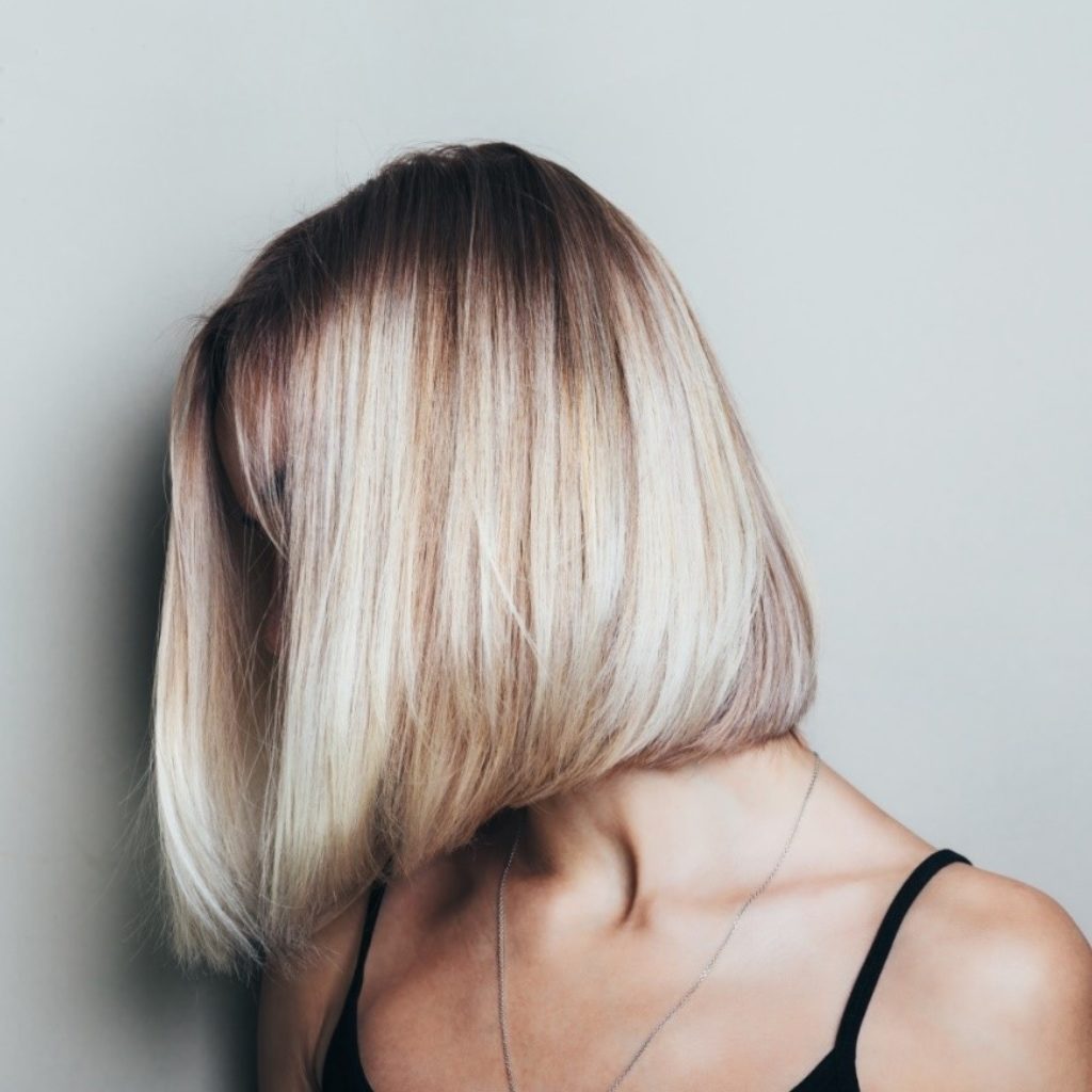 Straight shoulder length blond highlights