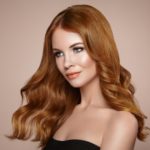 womens long wavy auburn hair color