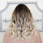 womens long wavy blond balayage hair color