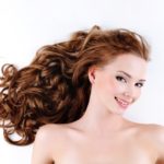 womens long copper mermaid hairstyle brown hair