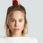 womens half up bun hairstyle blonde hair