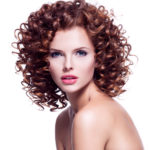 womens shoulder length curly lob hairdo