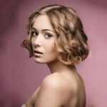 womens short bob curly hairstyle blonde hair