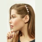 womens shoulder length hairstyle with a headband brown hair