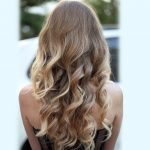 women-curly-long-layered-blonde-hair