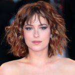 dakota-johnson-see-through-bangs-short-curly-hair