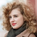 women's-shoulder-length-curl-side-bangs-hairstyle