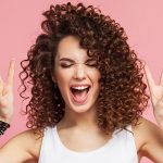 shoulder length medium tight curls hairstyle
