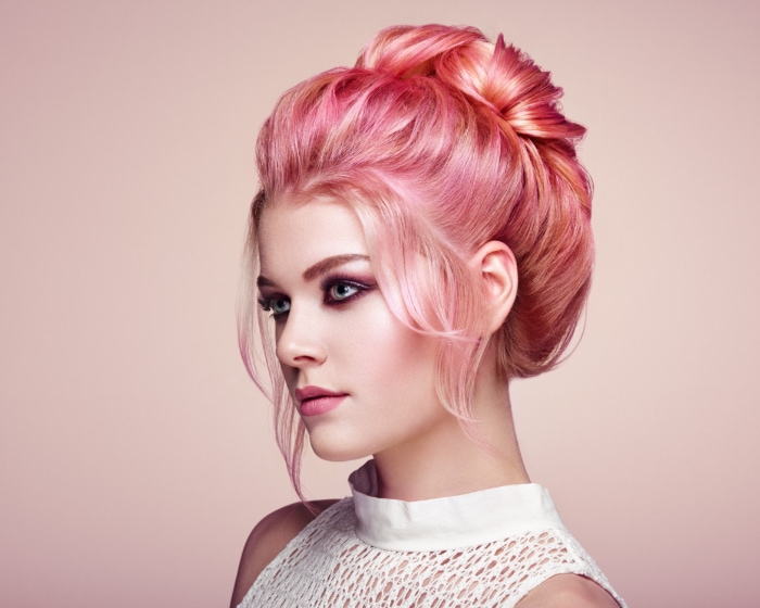 Pink hairstyle in a bun