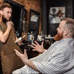 men asking what hairstyle they want to the hairdresser