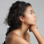 womens long black braided curly hairstyle