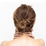 womens messy bun hairstyle brown hair