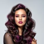 womens long wavy purple highlights on black hair color