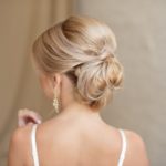 womens long blonde hair updo wedding occasion
