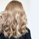 womens-mid-length-razor-cut-hair-blonde-wavy-styling